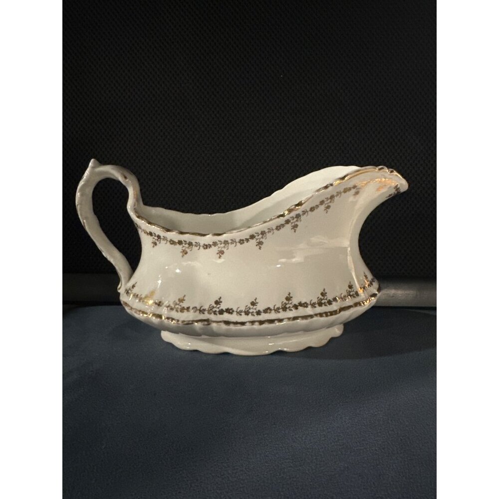 Vintage Porcelain Gold-Trimmed Gravy Boat With Floral Design